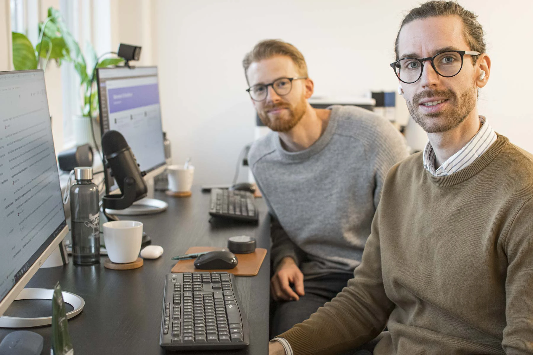 Två män jobbar på webbyrå i Göteborg